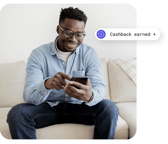 man earning cashback on device